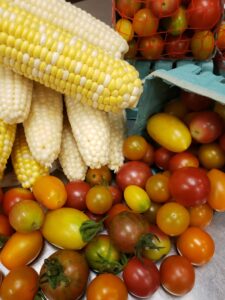 farm fresh tomatoes and corn