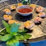 grilled shrimp, mango cocktail sauce, hammered metal platter, fresh geens garnish